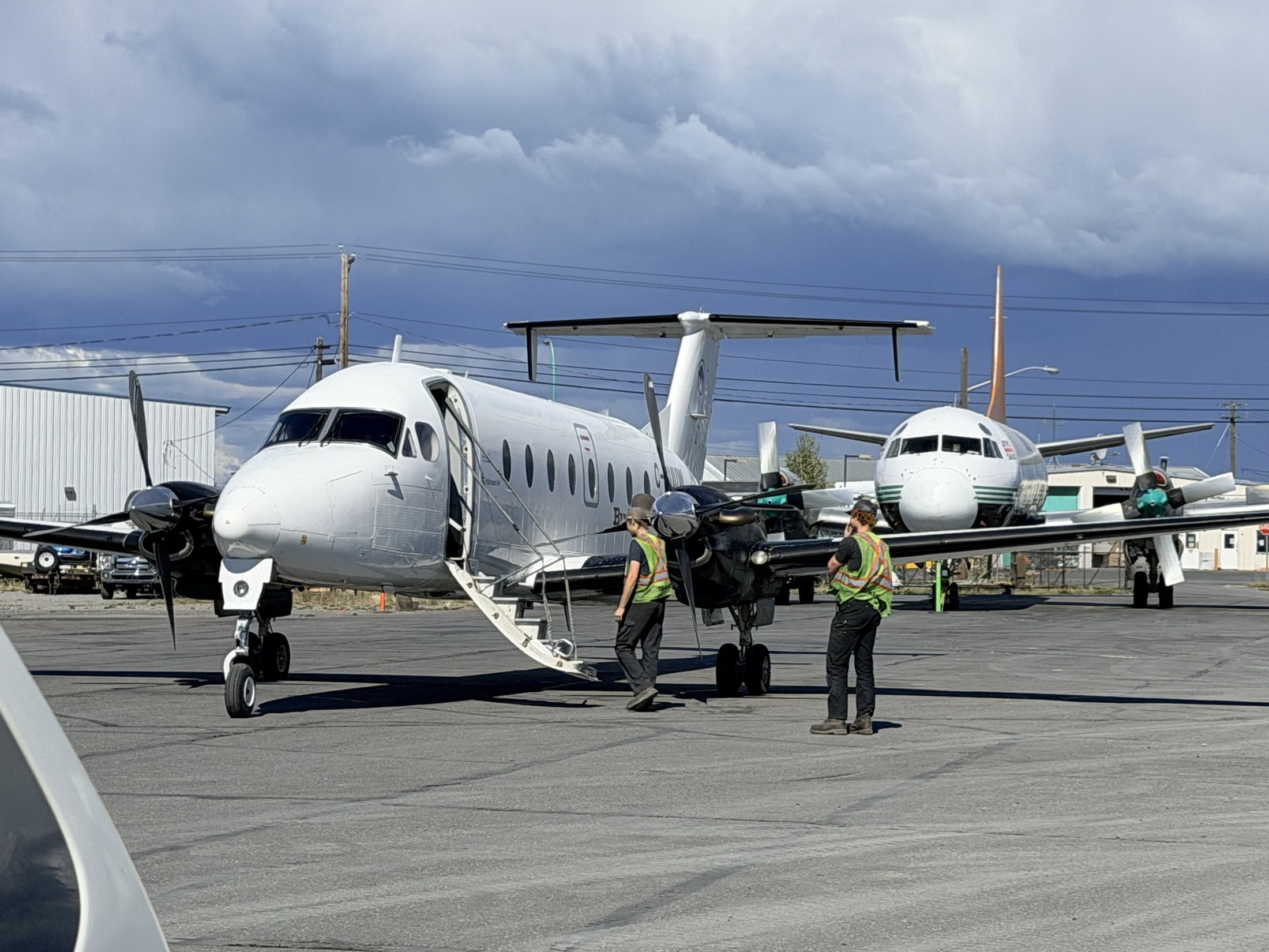 C-GUUW on the ramp with an Electra nose-on behind