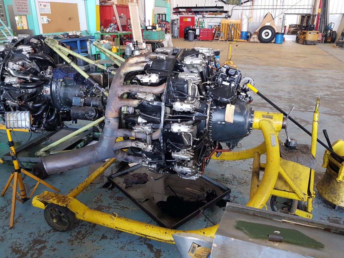 A radial engine on a stand in the Buffalo maintenance shop