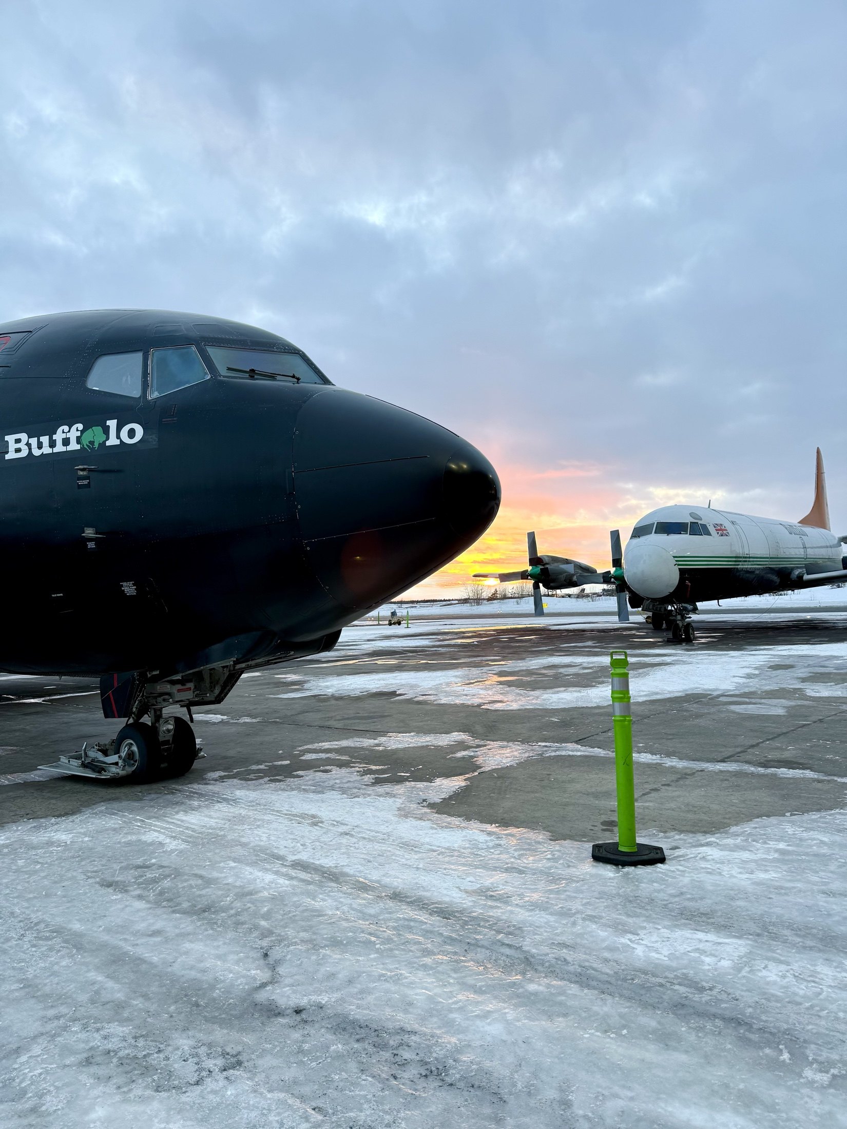 C-GTVO’s nose at winter sunset with an Electra behind