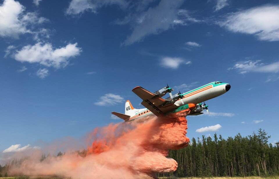 Electra making a retardant drop over forest