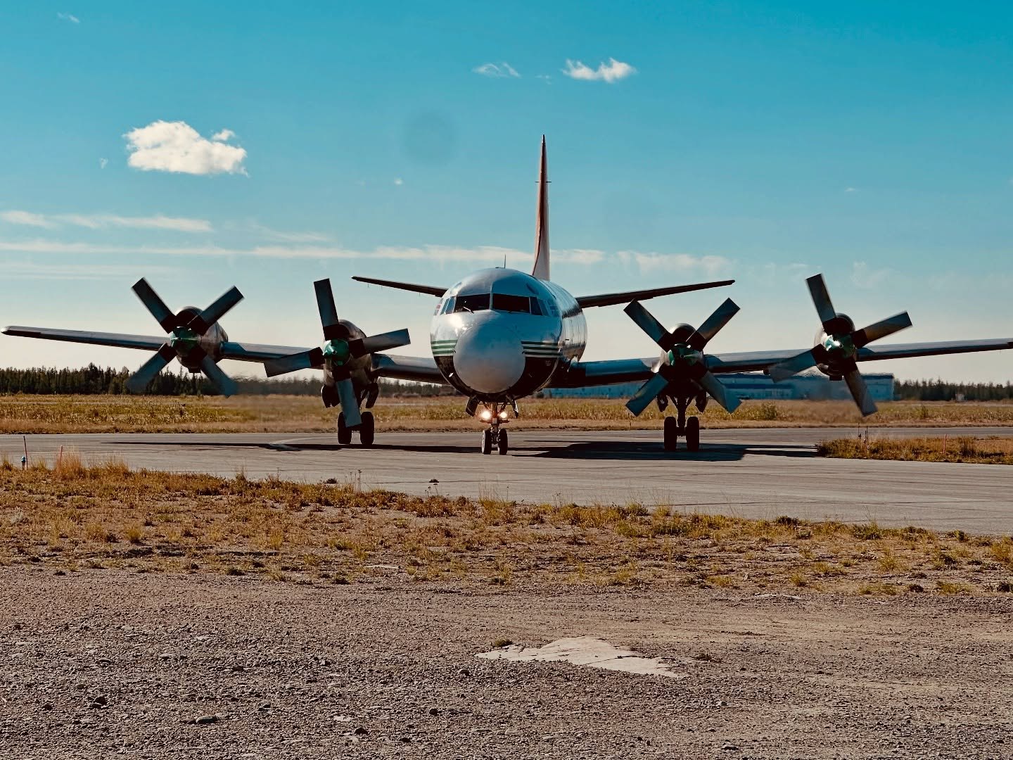 Electra head-on, all four turning, coming onto the ramp in evening light