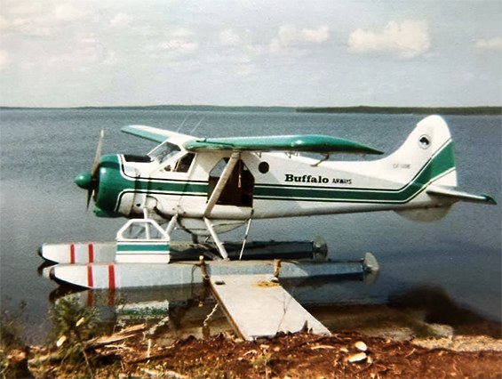 Buffalo Airways DHC-2 Beaver on floats at a lakeshore in the 1970s